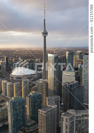 The CN Tower and Rogers Centre during a sunny day The CN Tower and Rogers Centre during a sunny day 91155566