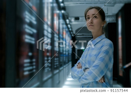 Young woman looking around in modern historical museum Young woman looking around in modern historical museum 91157544