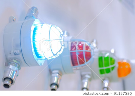 Close up of alarm lamp signal warning flashing lights for industrial machinery Close up of alarm lamp signal warning flashing lights for industrial machinery 91157580