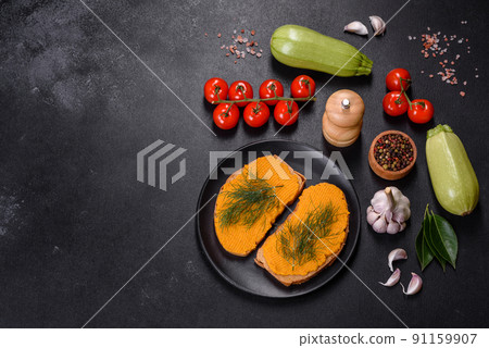 Delicious squash caviar sandwiches on a dark concrete background, healthy breakfast Delicious squash caviar sandwiches on a dark concrete background, healthy breakfast 91159907