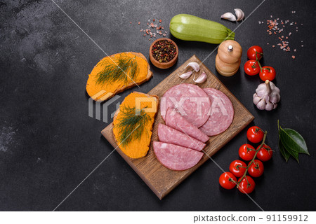 Delicious squash caviar sandwiches on a dark concrete background, healthy breakfast Delicious squash caviar sandwiches on a dark concrete background, healthy breakfast 91159912