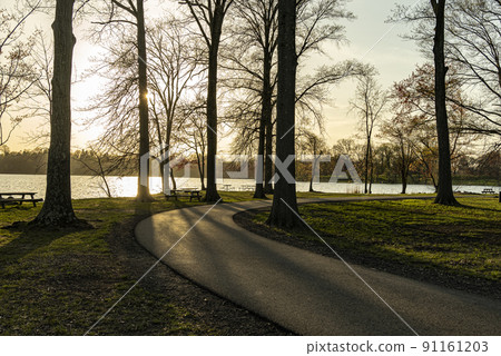 Sunset Fall Colors in Rockland Lake at springtime, New York 91161203