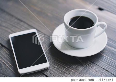 Smartphone and coffee 91167561