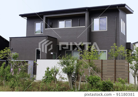 Exterior of a house with a veranda 91180381