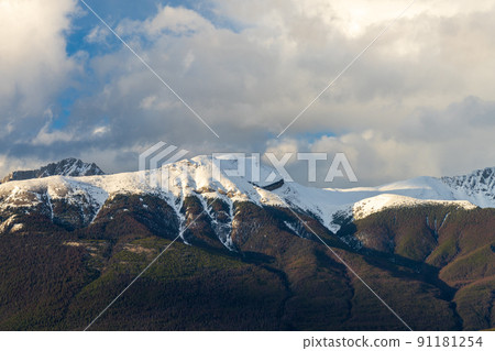 Snow capped Mount Roche Bonhomme. Jasper National Park, Canadian Rockies, Alberta, Canada. This peak is also locally known as Old Man face Mountain. 91181254