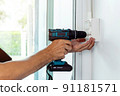 Install the power sockets and switches in the outlet box on the wall. 91181571