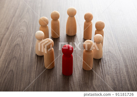 Wooden people figures on top of wooden blocks. Career growth, development and leadership 91181726