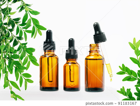 Natural medicine or aroma oil concept vial with dropper 91183167