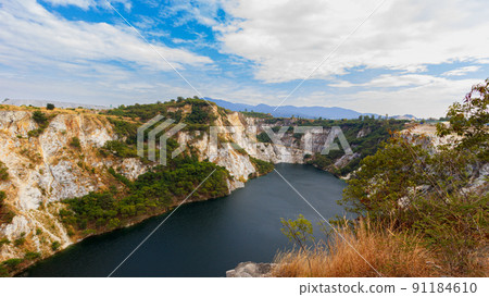 Grand Canyon, a quarry that looks like a rocky mountain with a river in the middle, in Chonburi Province, Thailand. 91184610