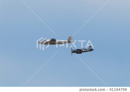 B-25J F4U-4 Corsair carrier-capable fighter escorting Mitchell bomber B-25J F4U-4 Corsair carrier-capable fighter escorting Mitchell bomber 91184799