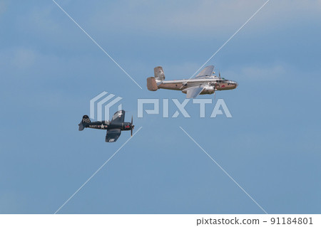 B-25J F4U-4 Corsair carrier-capable fighter escorting Mitchell bomber 91184801
