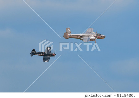 B-25J F4U-4 Corsair carrier-capable fighter escorting Mitchell bomber 91184803