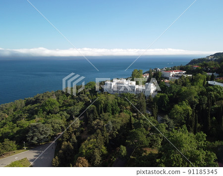 Aerial View of Livadia Palace - located on the shores of the Black Sea in the village of Livadia in the Yalta region of Crimea. Livadia Palace was a summer retreat of the last Russian tsar Nicholas II Aerial View of Livadia Palace - located on the shores of the Black Sea in the village of Livadia in the Yalta region of Crimea. Livadia Palace was a summer retreat of the last Russian tsar Nicholas II 91185345