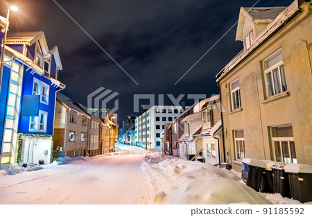 Traditional houses in Tromso at a winter night in Polar Norway Traditional houses in Tromso at a winter night in Polar Norway 91185592
