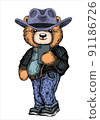 Cute teddy bear in Christmas hat and blue jeans. Cool boy selfie 91186726