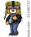 Cute teddy bear in biker helmet and blue jeans. Cool boy selfie 91186737