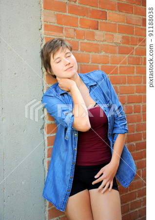 Female beauty fashion model expressions outdoors. 91188038