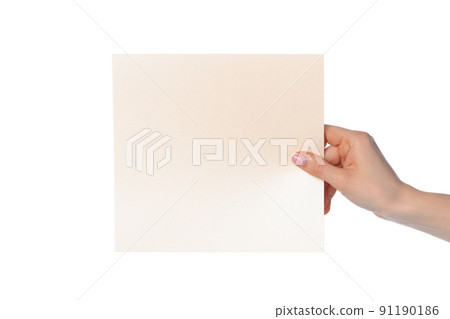 Woman's hand showing white paper banner isolated on white Woman's hand showing white paper banner isolated on white 91190186
