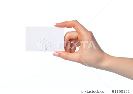Female hand with blank white business card isolated on white Female hand with blank white business card isolated on white 91190191