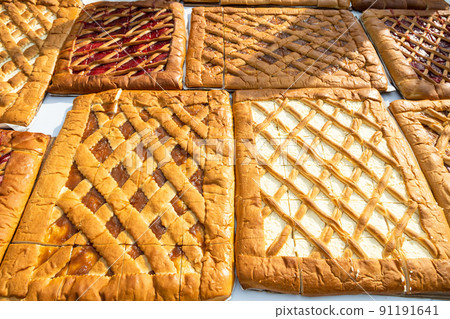 fresh baked big flat sweet filled pies on table fresh baked big flat sweet filled pies on table 91191641