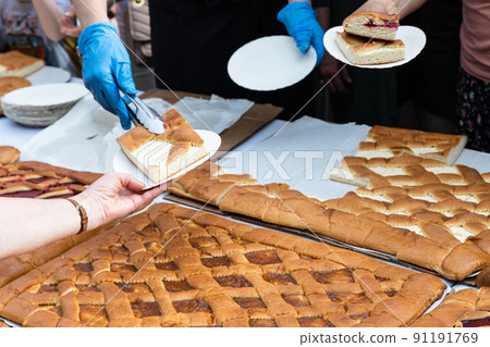 placing portion of sweet cheese pie in plate placing portion of sweet cheese pie in plate 91191769