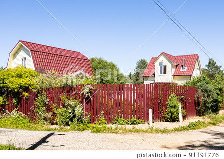 street in summer cottage village in sunny day 91191776