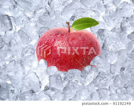 Fresh apple on ice cubes background Fresh apple on ice cubes background 91192249