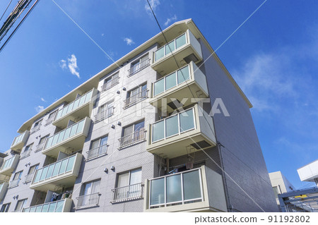 Exterior of the apartment and blue sky Exterior of the apartment and blue sky 91192802
