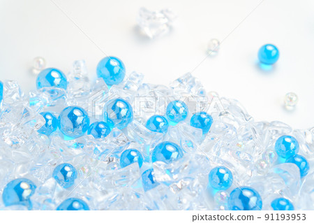 Glitter background of acrylic ice cream and blue marbles Glitter background of acrylic ice cream and blue marbles 91193953