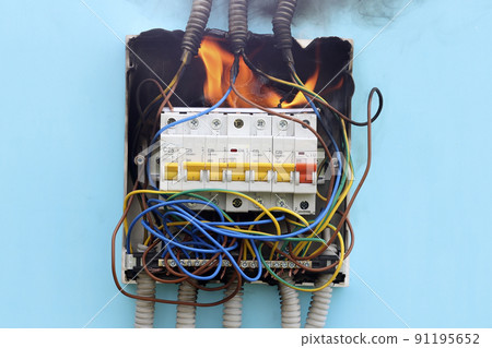 Electrical fire resulting from short circuit in faulty electrical wiring. Electrical fire resulting from short circuit in faulty electrical wiring. 91195652