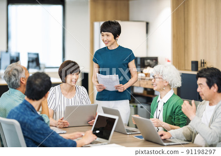 Lively middle-senior business person Lively middle-senior business person 91198297