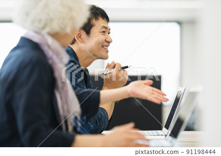 Middle-aged businessman having a meeting 91198444