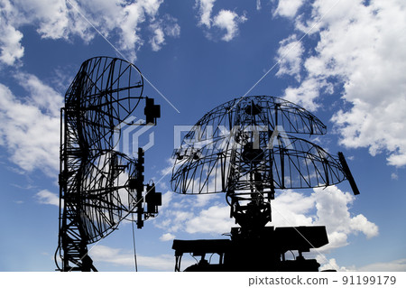 Air defense radars of military mobile anti aircraft systems, modern army industry on background beautiful clouds and sky, Russia 91199179