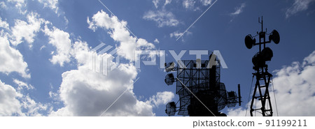 Air defense radars of military mobile anti aircraft systems, modern army industry on background beautiful clouds and sky, Russia 91199211