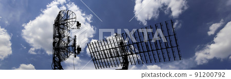 Air defense radars of military mobile anti aircraft systems, modern army industry on background beautiful clouds and sky, Russia Air defense radars of military mobile anti aircraft systems, modern army industry on background beautiful clouds and sky, Russia 91200792