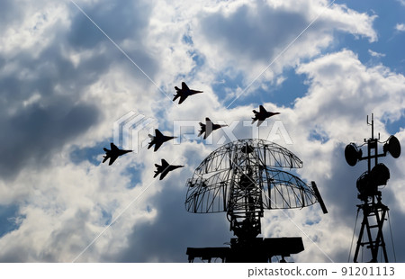 Air defense raiders of military mobile anti-aircraft complexes (radar is designed  and automatic tracking of targets and missiles) against the background of the flight of modern combat fighters,Russia 91201113