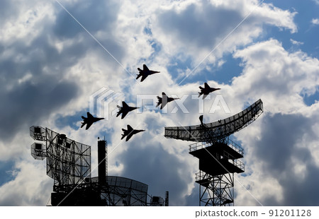 Air defense raiders of military mobile anti-aircraft complexes (radar is designed  and automatic tracking of targets and missiles) against the background of the flight of modern combat fighters,Russia 91201128