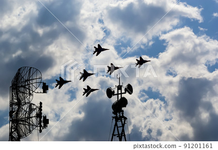 Air defense raiders of military mobile anti-aircraft complexes (radar is designed  and automatic tracking of targets and missiles) against the background of the flight of modern combat fighters,Russia 91201161