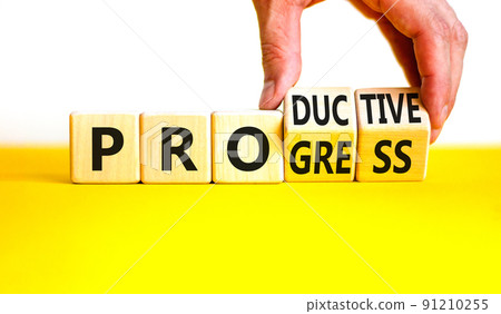 Word progress and productive symbol. Businessman turns cubes and changes the concept word Productive to Progress. Beautiful white background. Business progress and productive concept. Copy space. 91210255
