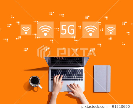 5G network with person using a laptop 91210690