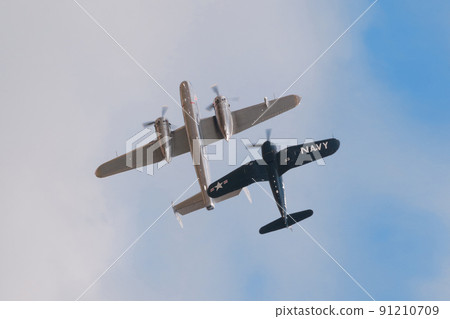 B-25J F4U-4 Corsair carrier-capable fighter escorting Mitchell bomber 91210709