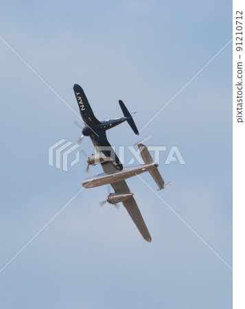 B-25J F4U-4 Corsair carrier-capable fighter escorting Mitchell bomber B-25J F4U-4 Corsair carrier-capable fighter escorting Mitchell bomber 91210712