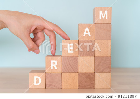 Dream image | Blocks and hands with "DREAM" written on them Dream image | Blocks and hands with "DREAM" written on them 91211897