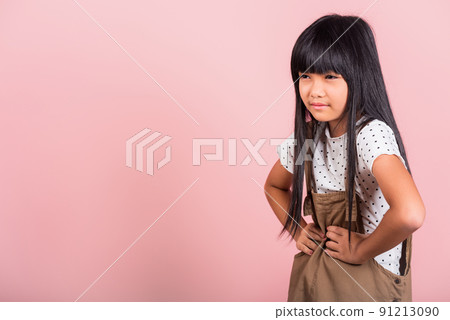 Asian little kid 10 years old suffering from stomach ache Asian little kid 10 years old suffering from stomach ache 91213090