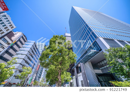 Tokyo cityscape of Japan: View of Nippon Life Hamamatsucho Claire Tower and cityscape. In the back is the World Trade Center building demolition work 91221749