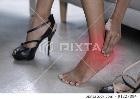 Asian woman feet pain wear high heel shoes 91227894