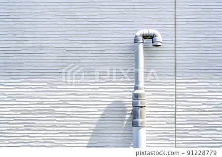 Exposed drainage pipe of a house 91228779