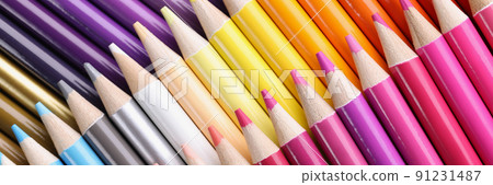 Big assortment of colourful pencils placed over each other 91231487