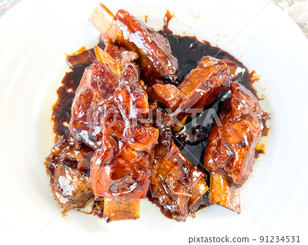 Chinese Shanghai cuisine, red-cooked pork ribs (spare ribs boiled in soy sauce) Chinese Shanghai cuisine, red-cooked pork ribs (spare ribs boiled in soy sauce) 91234531