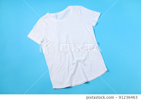 Blank white t-shirt with space for print on blue background 91236463